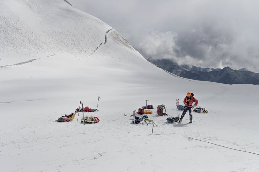 A climber on a snowy peak in the La Paz Andes