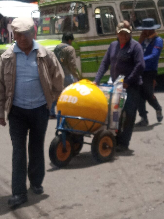 A street vendor selling somó from a cart in El Alto, Bolivia