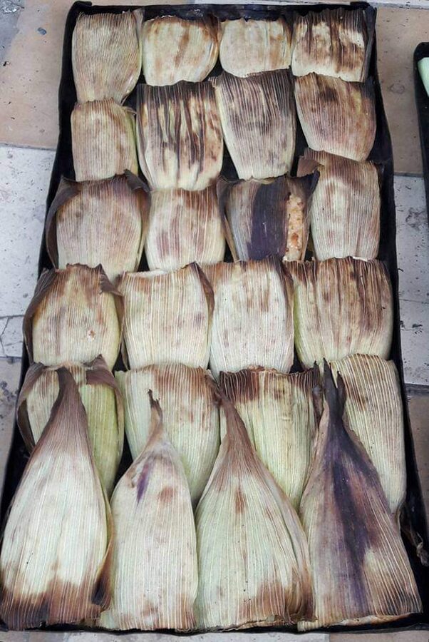 Humintas de Sorata, sweet steamed corn cakes wrapped in corn husks