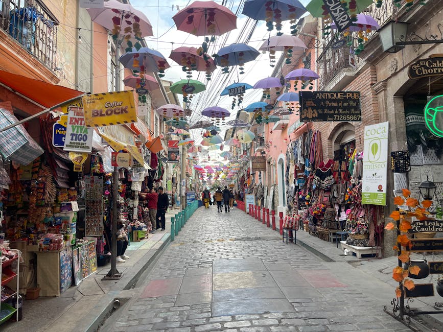 Bolivian market street with colourful umbrellas in La Paz