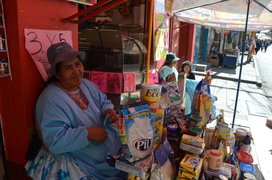 La Paz: Cable Car, Cemetery, Shaman, and El Alto Tour - Taking the red cable car toward El Alto