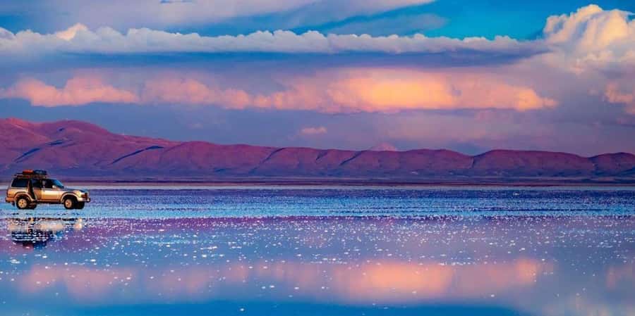 From Uyuni: Uyuni Salt Flats and Sunset Full-Day Tour - A day that moves from locomotives to salt
